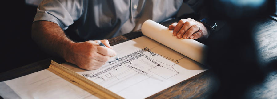 Plans d'architecte et dessins techniques pour la construction d'une maison neuve